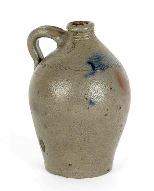 Appraisal: Small American stoneware jug th c with incised leaf band