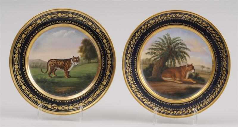 Appraisal: PAIR OF PARIS PORCELAIN PICTORIAL PLATES Retailed by Darte the