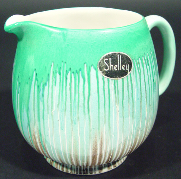 Appraisal: Art Deco Shelly china jug decorated with a green and