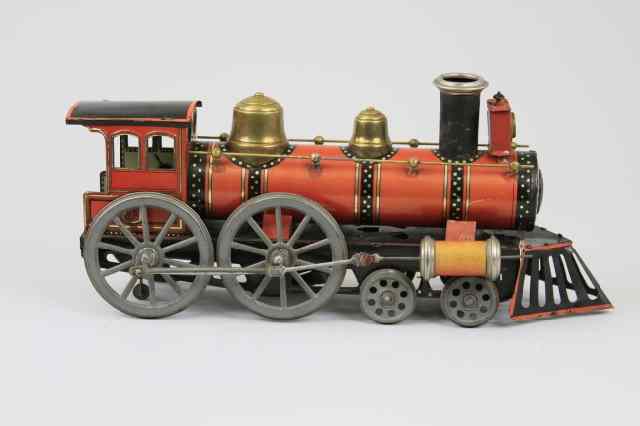 Appraisal: GUNTHERMANN LOCOMOTIVE Germany lithographed tin red body full compliment of