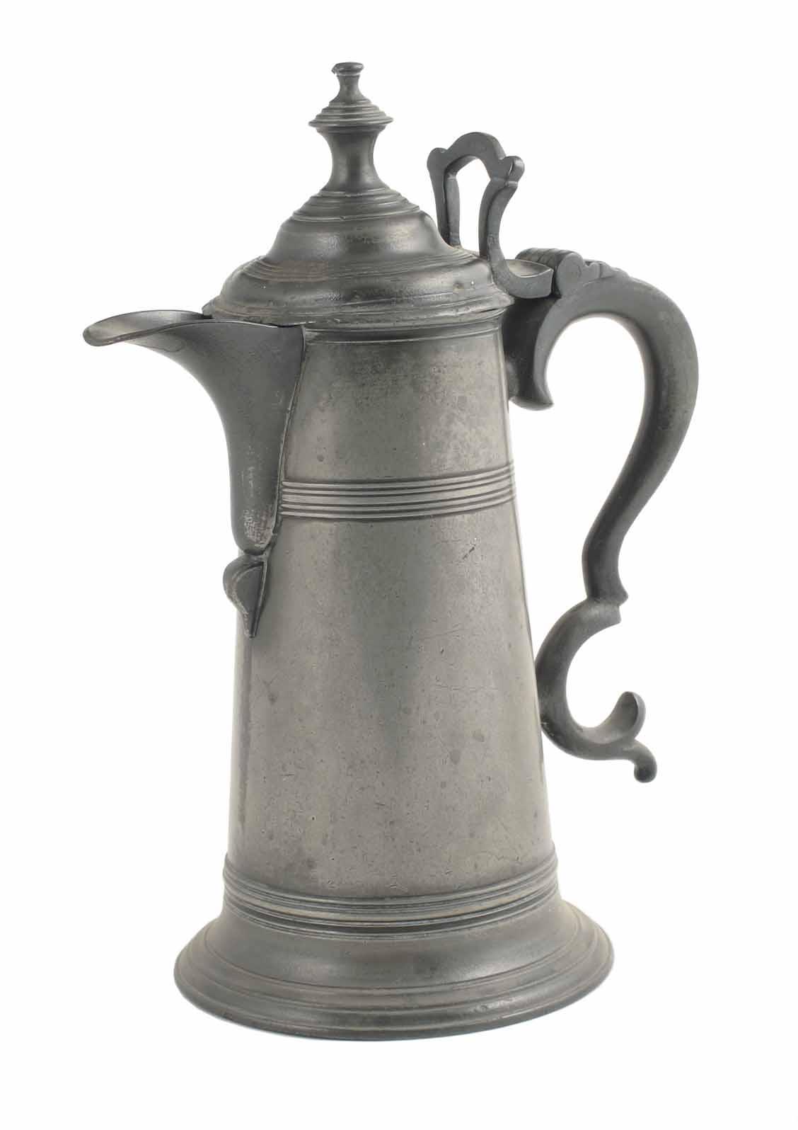 Appraisal: A pewter spouted Spire flagon