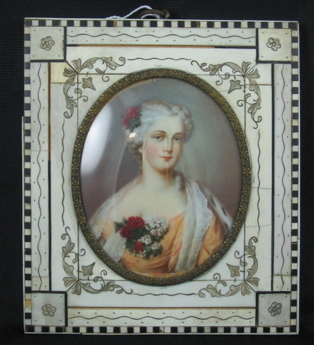 Appraisal: A MINIATURE OVAL PAINTING ON IVORY portrait of a lady