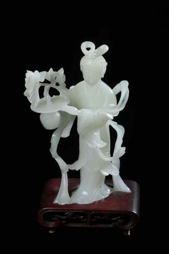 Appraisal: CHINESE WHITE JADE FIGURE OF DEITY Standing wearing long robes