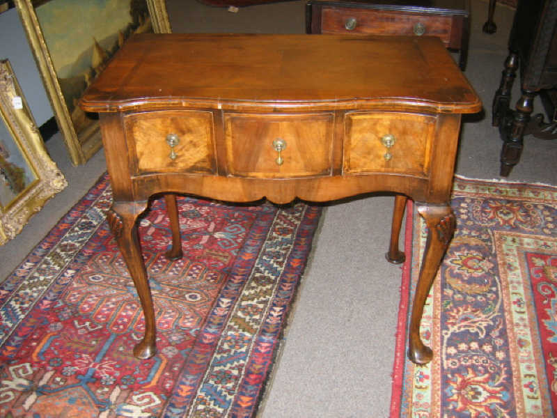 Appraisal: ENGLISH QUEEN ANNE STYLE WALNUT LOWBOY With a serpentine front