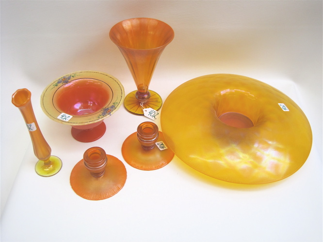 Appraisal: SIX PIECES ORANGE TANGERINE STRETCH GLASS bowl D vases and