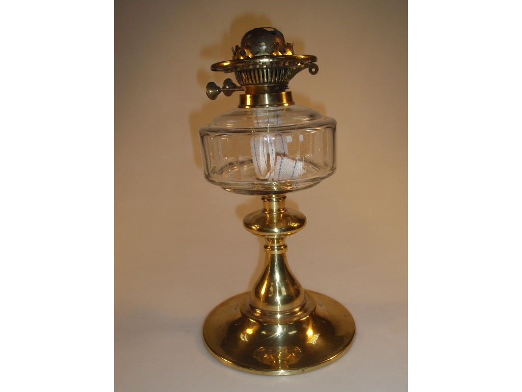 Appraisal: An early thC double burner oil lamp with clear glass