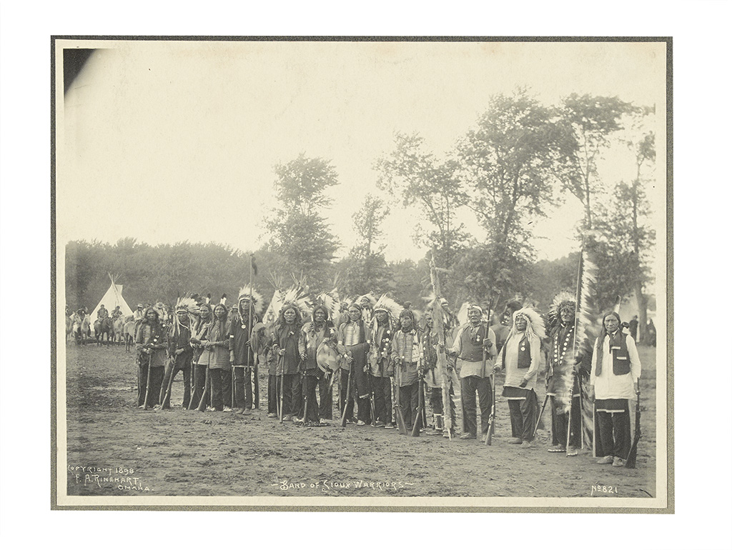 Appraisal: AMERICAN INDIANS--PHOTOGRAPHS Rinehart Frank A Band of Sioux Warriors Platinum