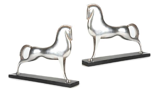 Appraisal: A pair of Art Deco style silvered metal figures of