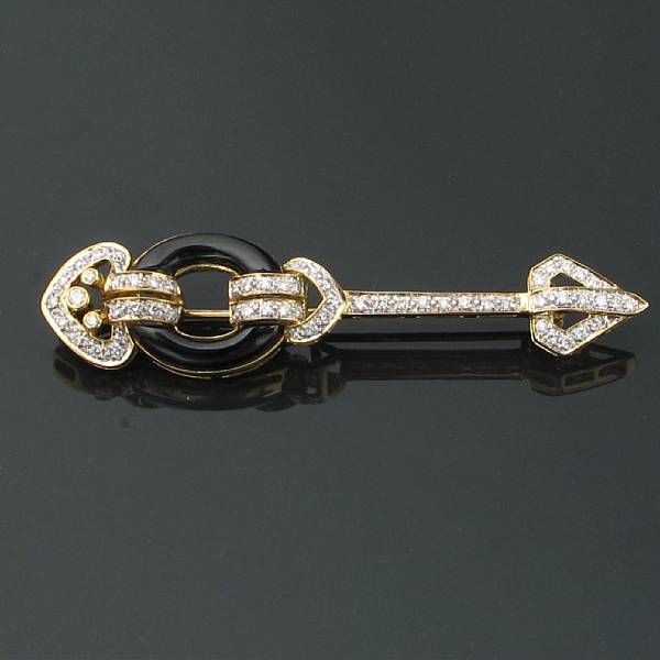 Appraisal: A black onyx diamond and k gold arrow brooch estimated