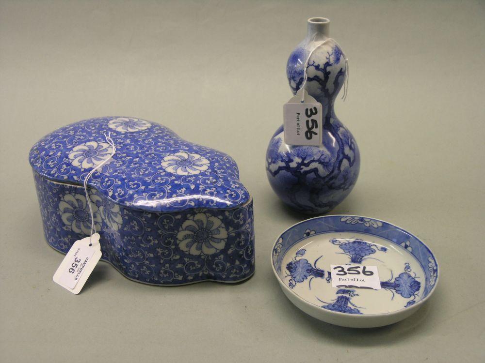 Appraisal: Three th century Chinese porcelain ornaments gourd shape box and