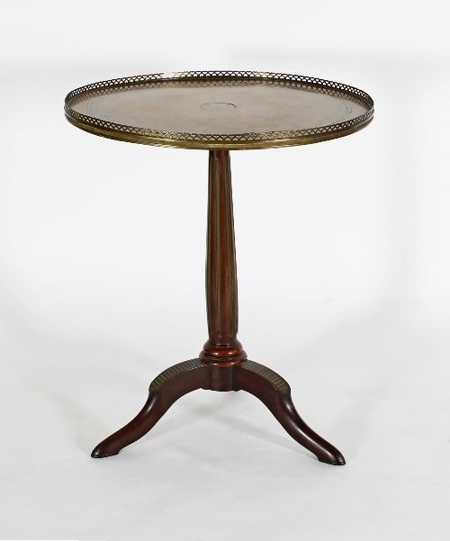 Appraisal: A French Empire gallery topped mahogany tripod table inlaid brass