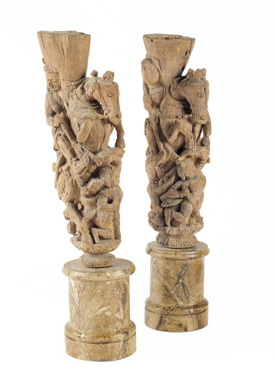 Appraisal: A pair of Burmese carved wood column supports