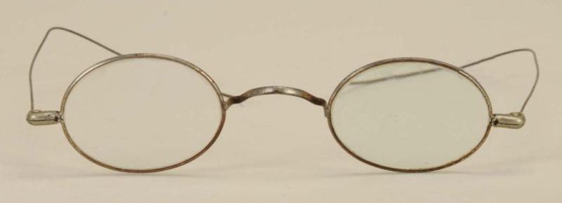 Appraisal: Pair of Early Spectacles Description Steel and wire Visible rust