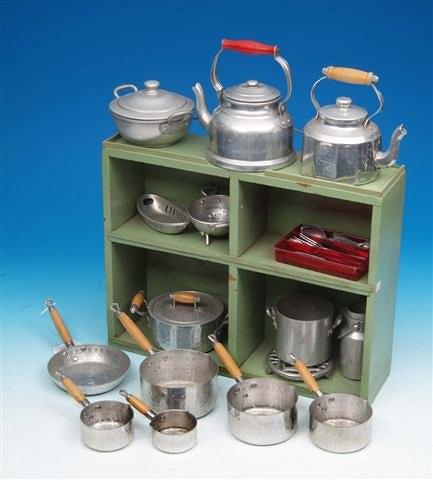 Appraisal: A JUVENILE 'KITCHENALIA' DISPLAY the green painted wall rack with