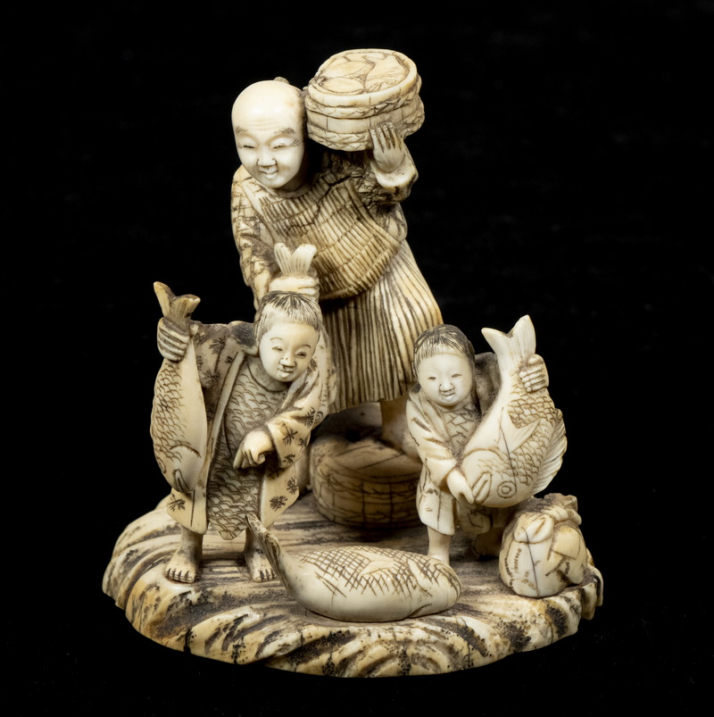 Appraisal: TH C JAPANESE IVORY FAMILY GROUP FISHERMAN Father and Two