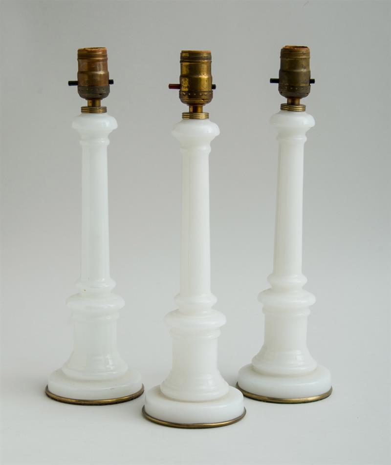 Appraisal: SET OF THREE MILK GLASS COLUMNAR FORM TABLE LAMPS Each