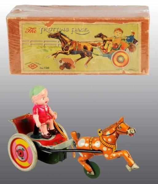 Appraisal: Tin Celluloid Trotting Race Wind-Up Toy Description Japanese Pre-war Working