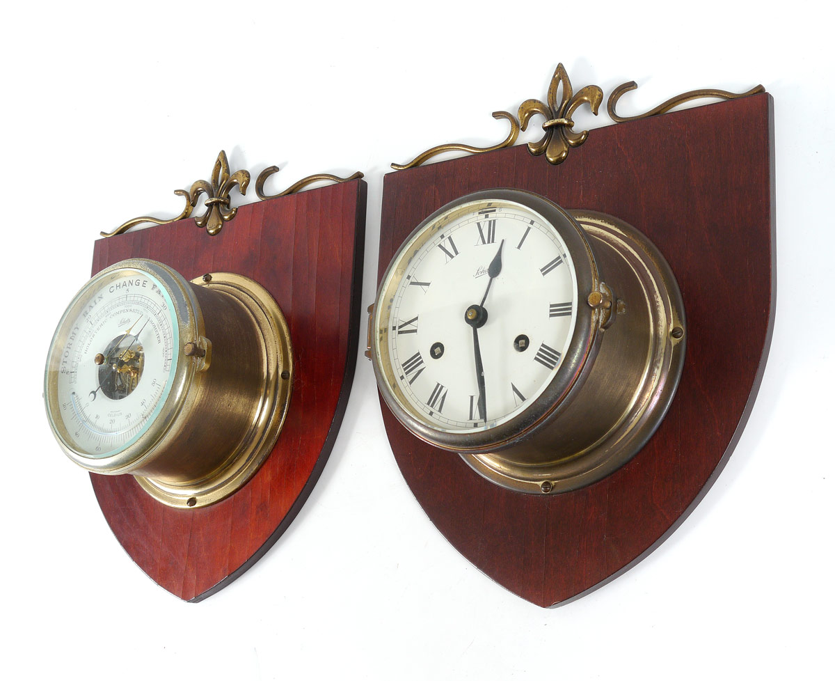 Appraisal: PAIR SCHATZ SHIP'S CLOCK BAROMETER Both mounted to shield form