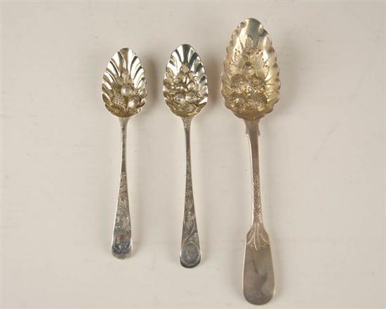 Appraisal: Three English Sterling Berry Spoons all with repousseed and gilt