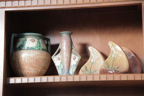 Appraisal: FIVE PIECES OF ROSEVILLE POTTERY Three bookends in Wincraft pattern