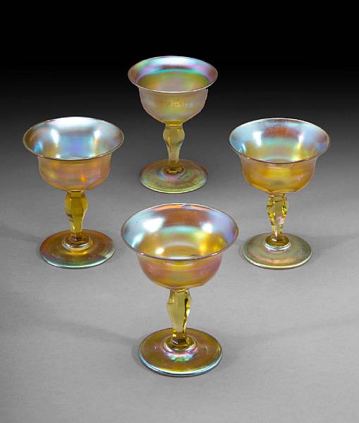 Appraisal: A set of four American iridescent faceted glass small wine