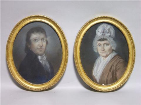 Appraisal: AMERICAN EARLY TH CENTURY PAIR OF PASTEL PORTRAITS Pastel x