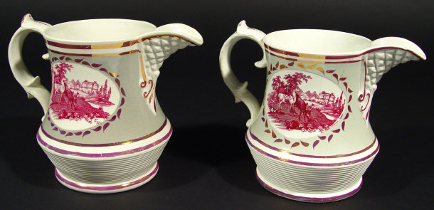 Appraisal: Pair of early th Century pottery jugs printed with purple