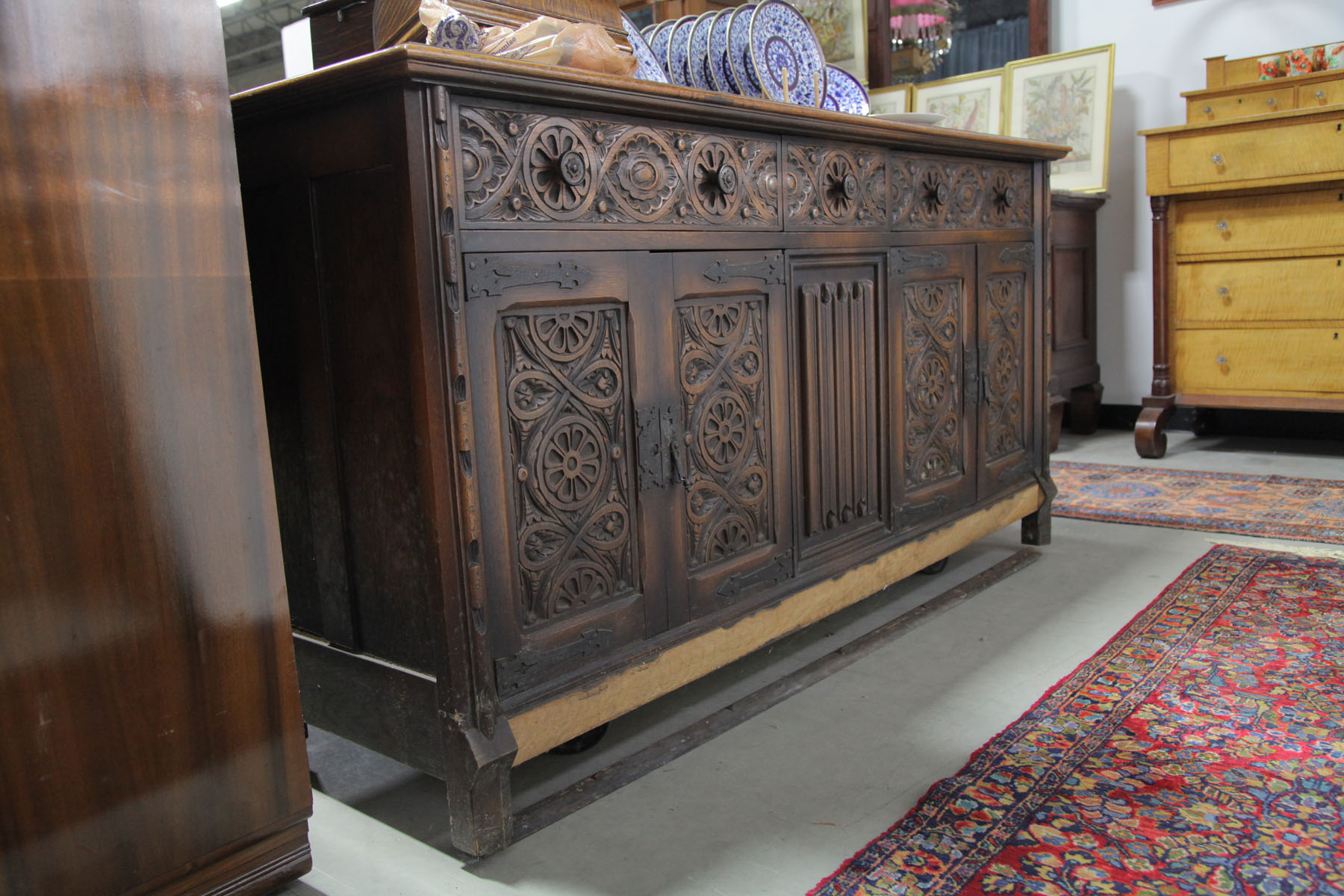 Appraisal: SIDEBOARD European early th century oak Carved sideboard having three