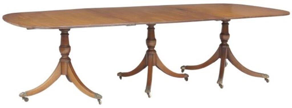 Appraisal: English Georgian style mahogany dining table th c oval tabletop