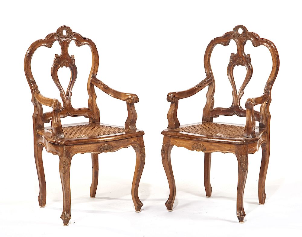 Appraisal: Pair of rococo style mixed wood miniature chairs Pair of