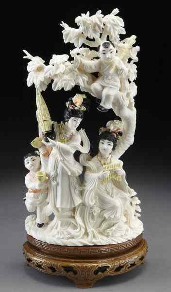 Appraisal: Chinese carved polychrome ivory figural group International buyers should note