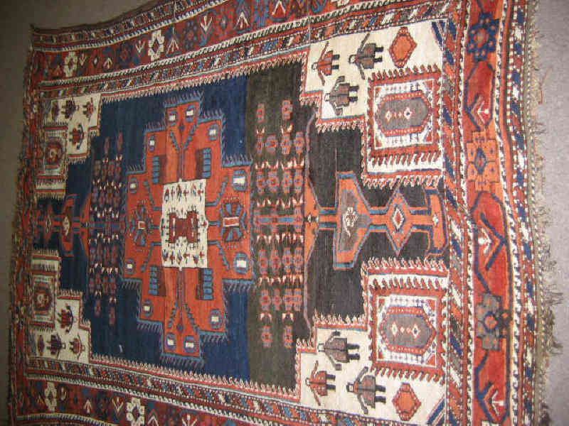 Appraisal: VERAMIN AREA RUG The abrashed indigo field centers an oversized