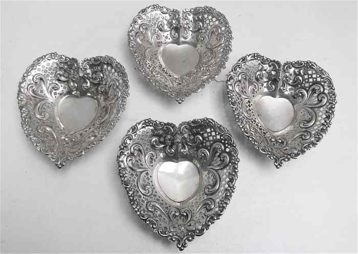 Appraisal: SET OF FOUR GORHAM STERLING SILVER BOWLS pattern tri-footed heart