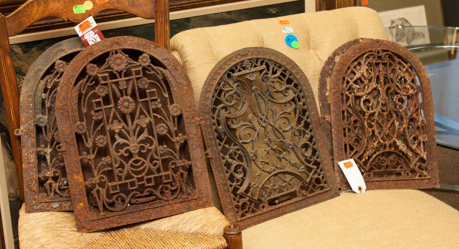 Appraisal: Five cast iron heat grates