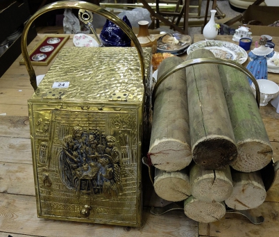 Appraisal: A brass coal scuttle and a brass log stand