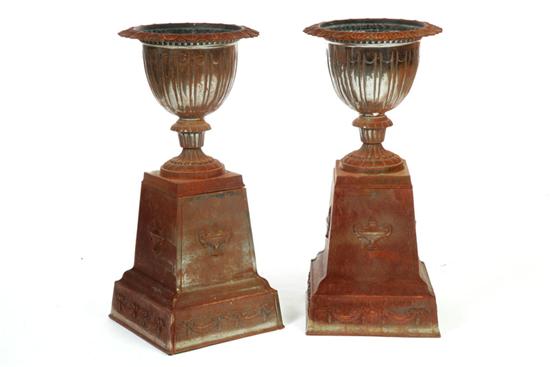 Appraisal: PAIR OF GARDEN URNS France mid th century steel Lobed