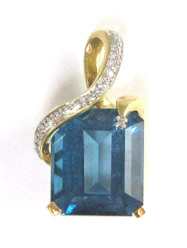 Appraisal: BLUE TOPAZ DIAMOND AND TEN KARAT GOLD PENDANT set with