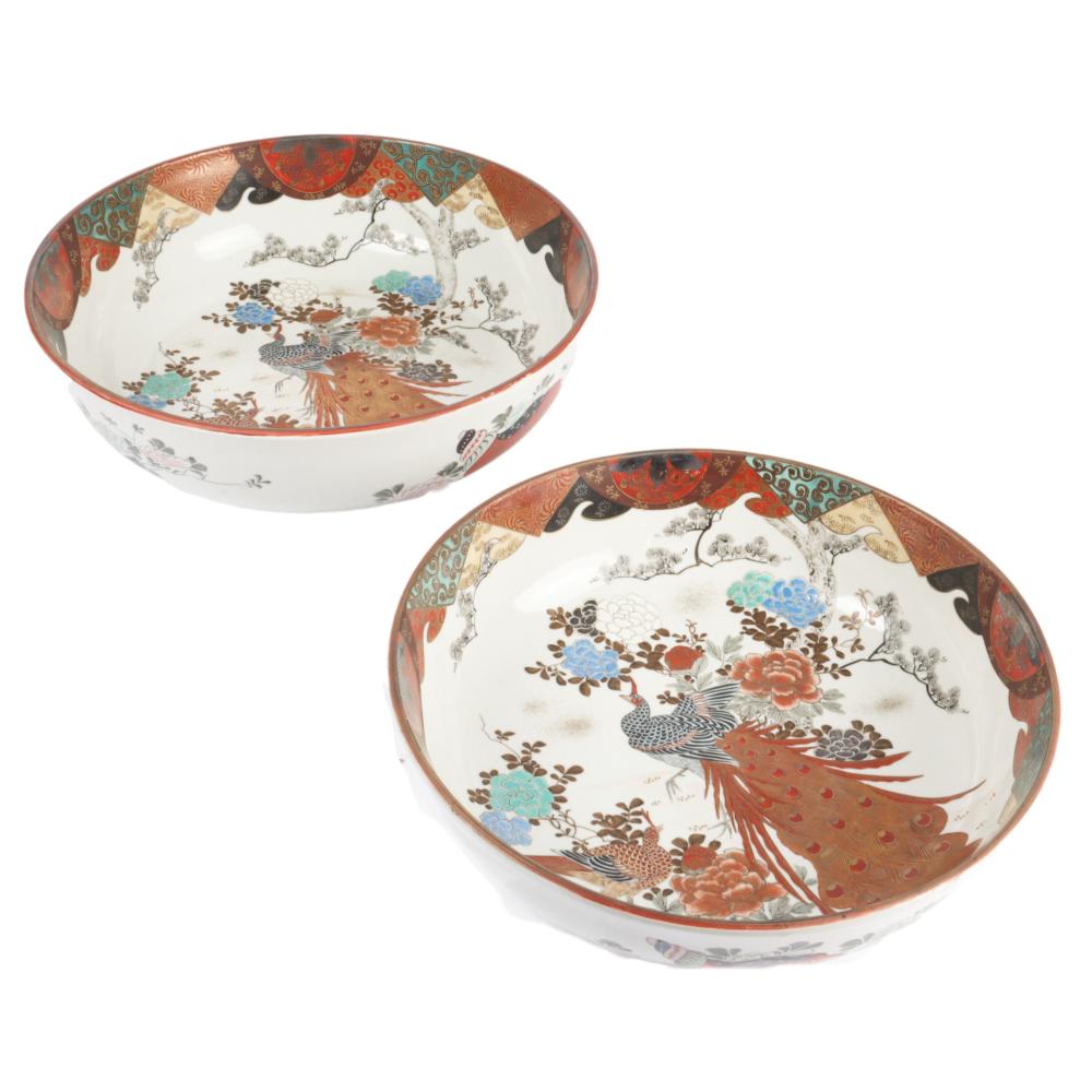 Appraisal: TWO JAPANESE KUTANI LARGE NESTING BOWLS WITH PEACOCK AND FLORALS