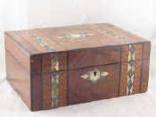 Appraisal: A large velvet lined Victorian walnut jewel box with mother