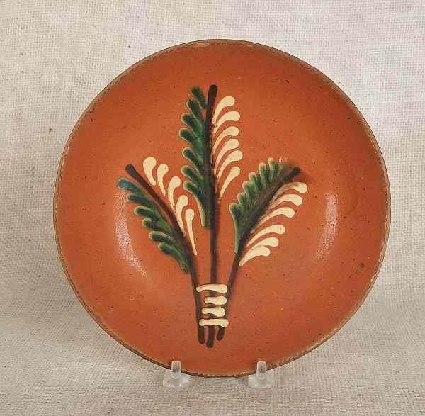 Appraisal: Pennsylvania redware pie plate th c attributed to Diehl Pottery