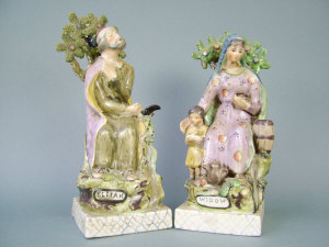 Appraisal: Two reproduction Staffordshire style pottery figures the first titled 'Elijah'