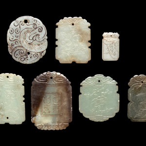 Appraisal: Seven Chinese Celadon Jade Carved Plaques each softly polished and