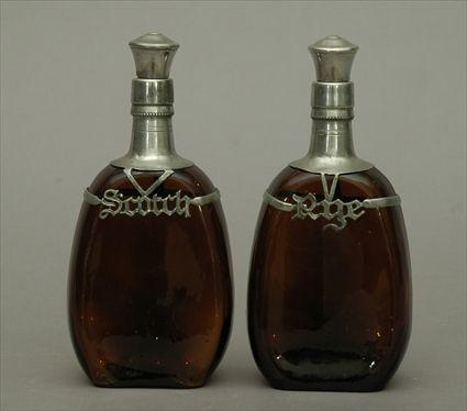 Appraisal: Two Amber Glass Decanters Each x in