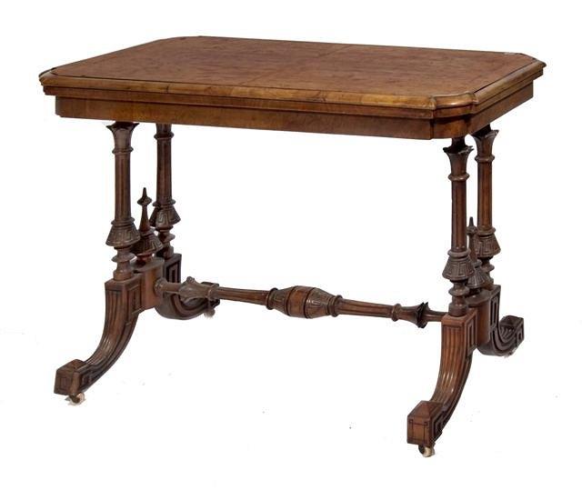 Appraisal: A VICTORIAN FIGURED WALNUT FOLD OVER CARD TABLE having a