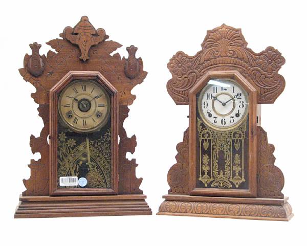 Appraisal: Two carved wood mantel clocks height of tallest in width