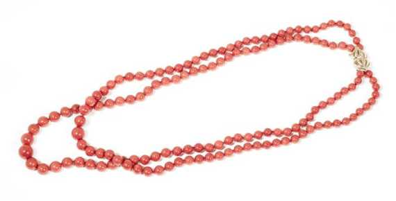 Appraisal: CORAL SAUTOIR Fastener yellow gold Casual-elegant two-row necklace of numerous