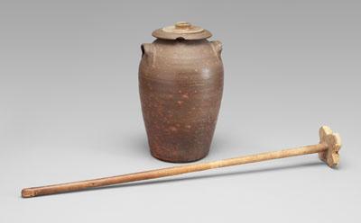 Appraisal: Salt-glazed stoneware churn ovoid with two lug handles downturned rim