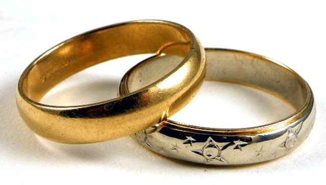 Appraisal: TWO FOURTEEN KARAT GOLD RINGS both man's rings together weighing