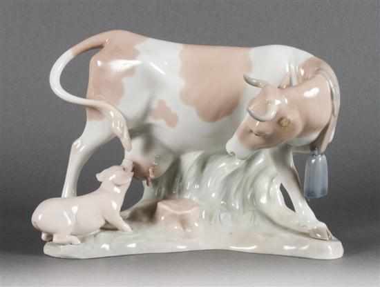 Appraisal: Lladro porcelain figure of a cow and a pig th