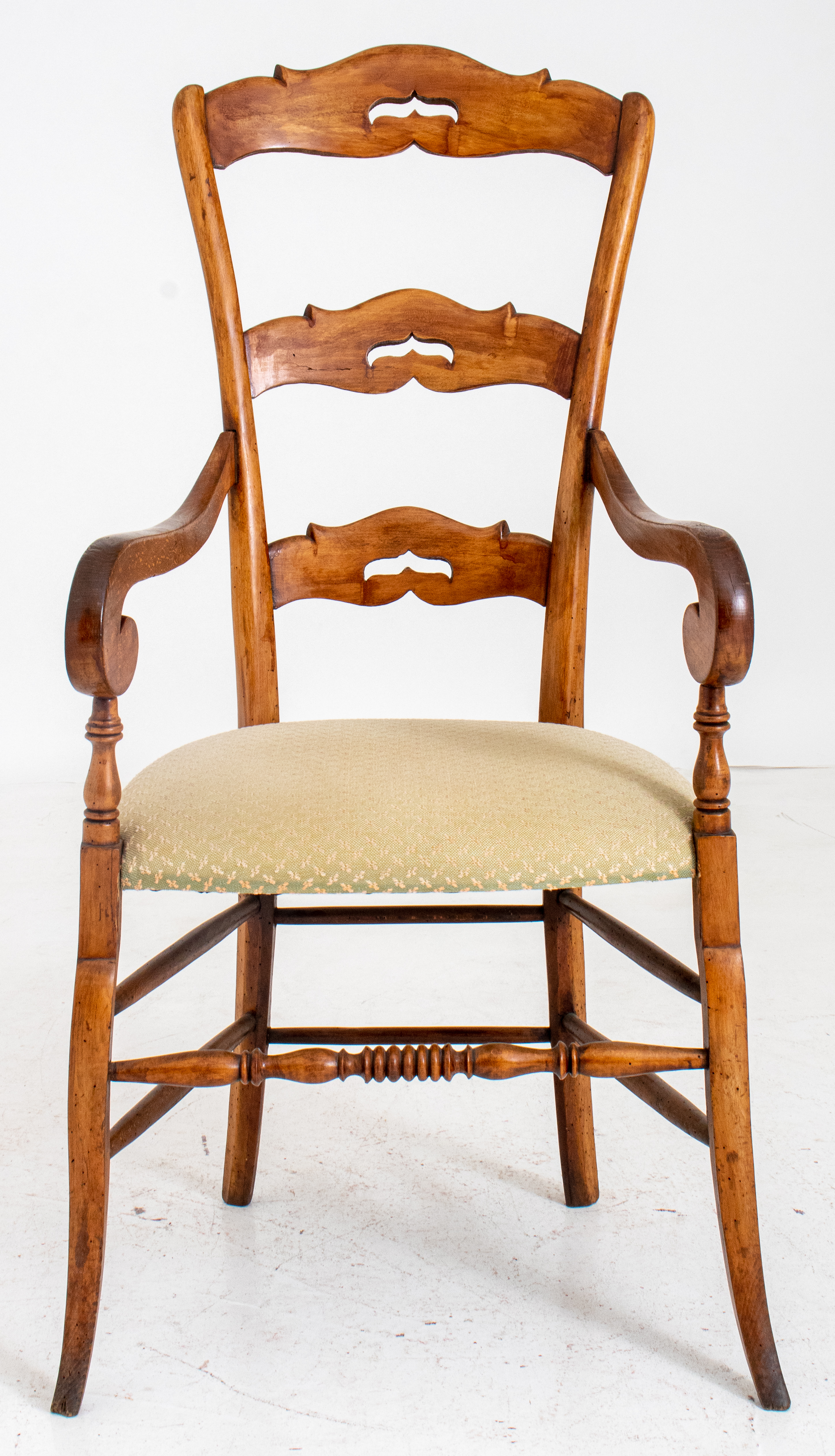 Appraisal: FRENCH PROVINCIAL STYLE FRUITWOOD ARMCHAIR French provincial style fruitwood armchair